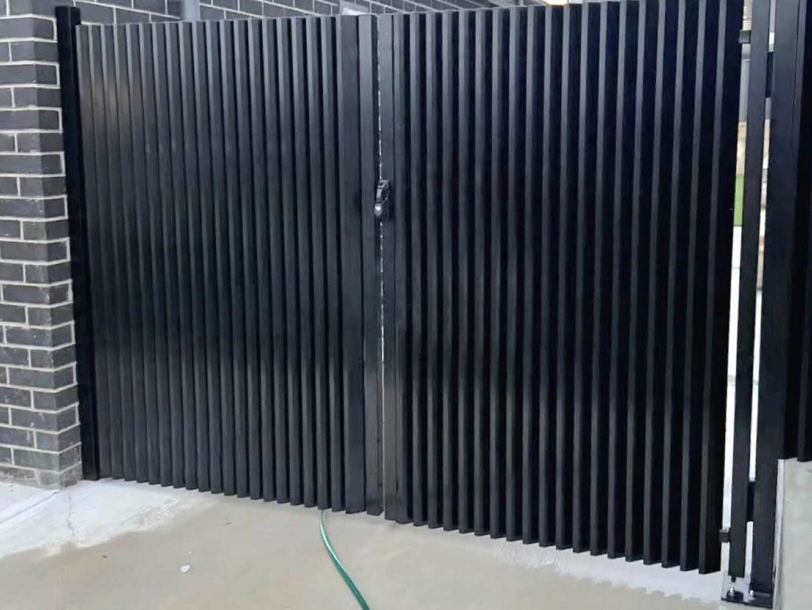 Heriton louvre privacy gate and screen installed outdoors